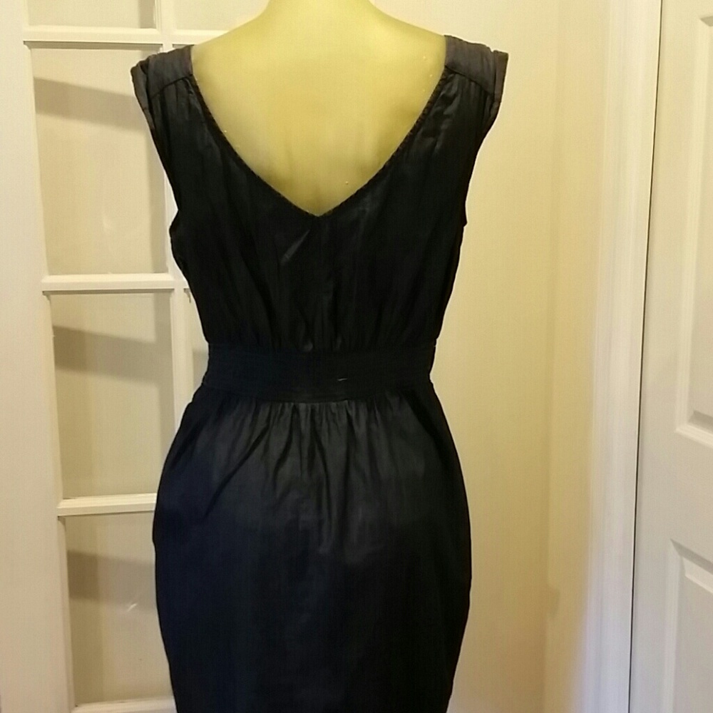 Dress soft denim like fabric. Great dress.